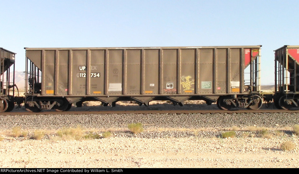 WB Unit Loaded Hooper Frt at Erie NV W-MdTrnSlv-Pshrs -60